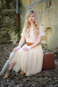 Woman wearing a vintage beige summer dress