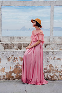 Woman wearing a vintage pink dress